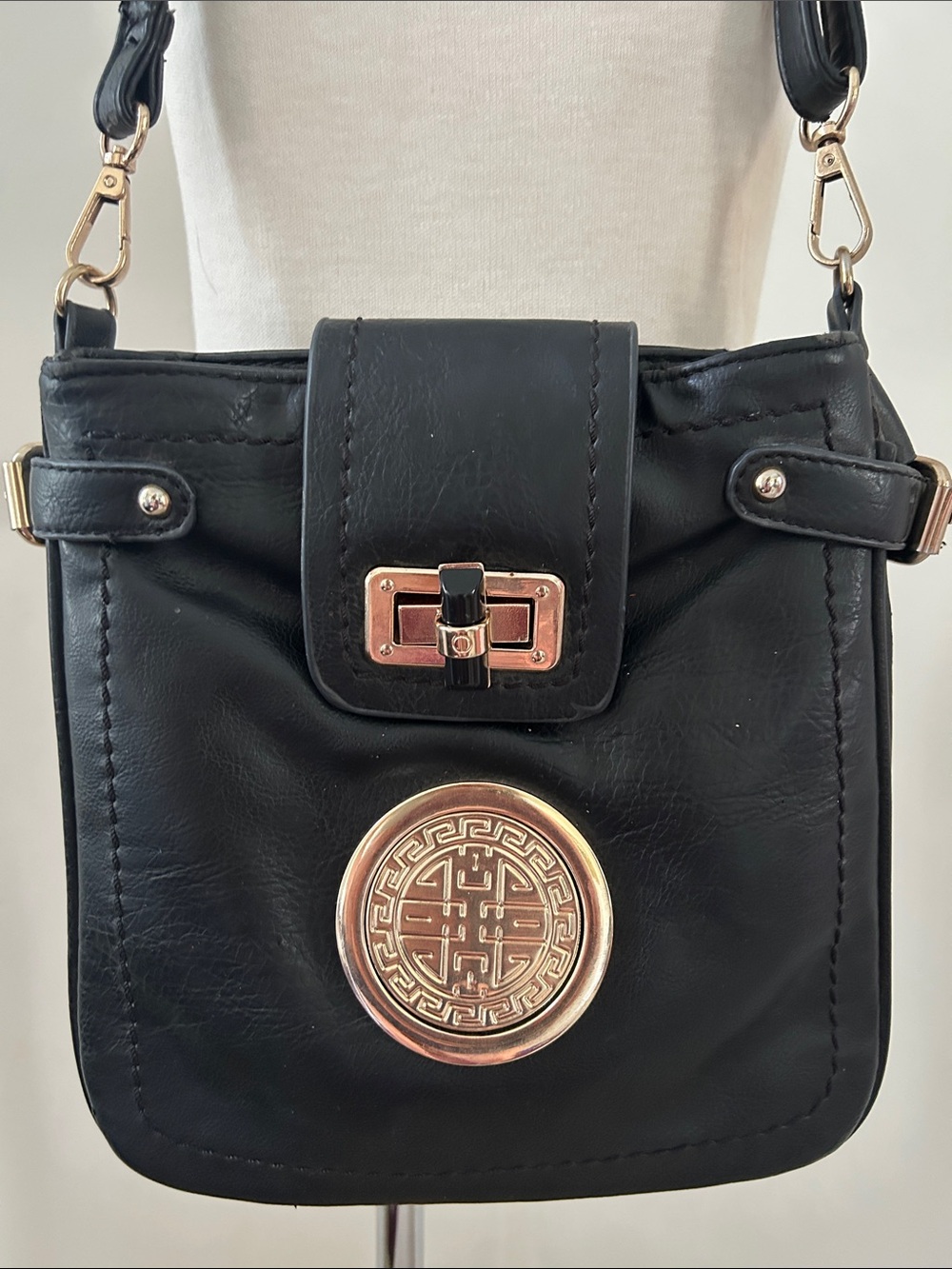 Black Faux Leather Shoulder Bag with Gold Asian Inspired Medallion